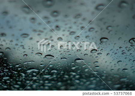 blur backgruond,Rain water on the car glass. blur backgruond,Rain water on the car glass. 53737068
