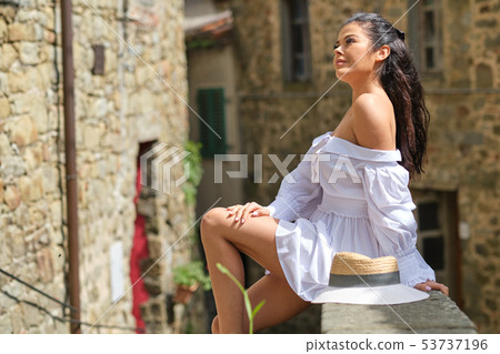 woman in summer dress walking and running joyful woman in summer dress walking and running joyful 53737196