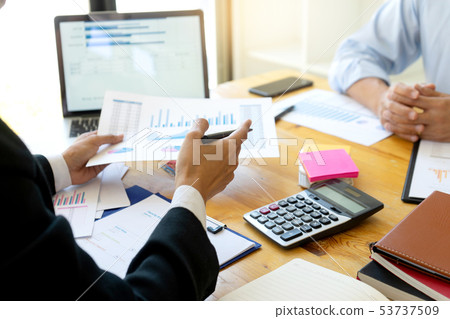 business businessman in meeting analyses chart 53737509