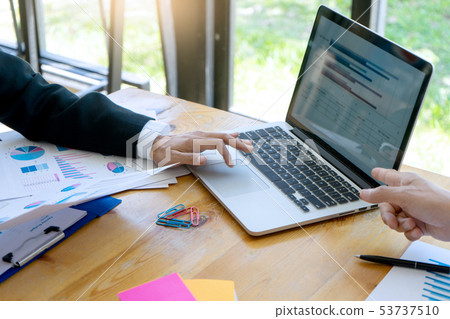 business businessman in meeting analyses chart 53737510