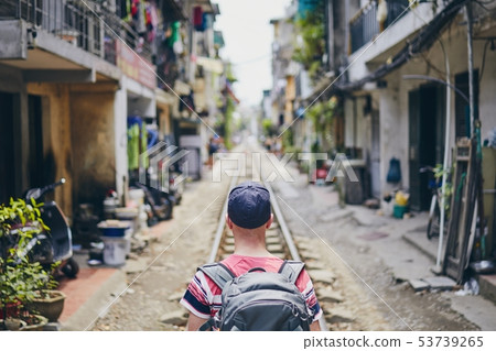 Traveler in Hanoi Train Street 53739265