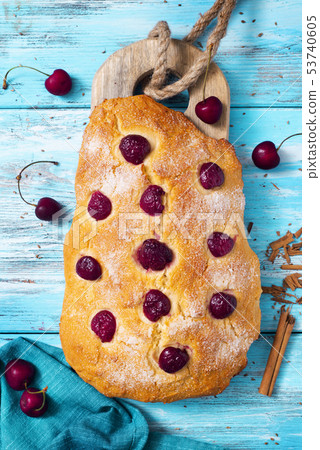 coca de cireres, a cherry flat cake from Catalonia 53740605