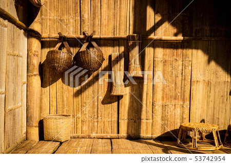 bamboo basket hanging on bamboo wall 53742954