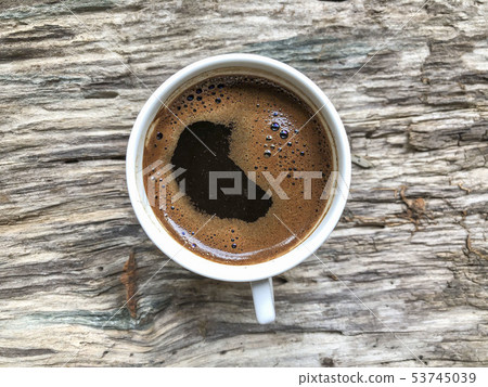 cup of Turkish coffee on a wooden table cup of Turkish coffee on a wooden table 53745039