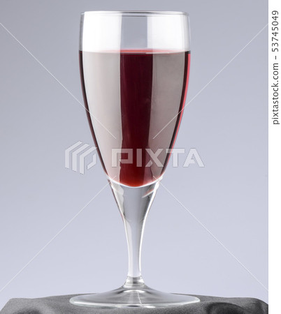 closeup of a glass of red wine 53745049