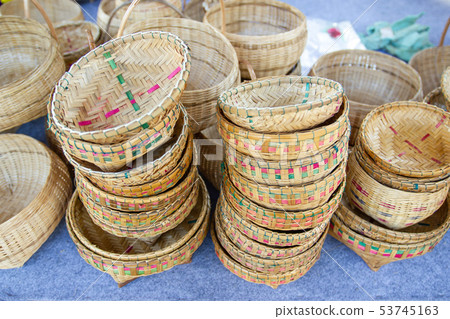 Community Products Weaving A Wicker Basket  53745163
