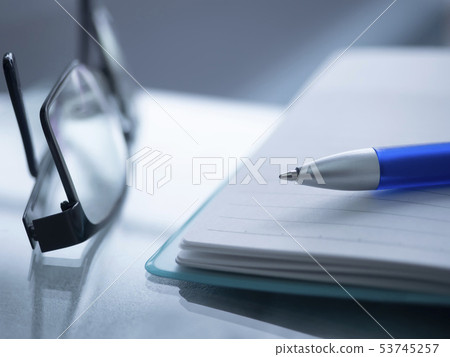 Business image · glasses · notebook Business image · glasses · notebook 53745257