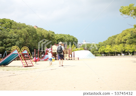 Parents and children going to the park 53745432