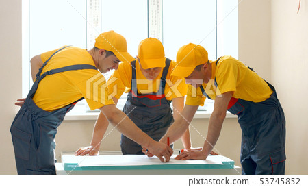 Engineers of building company create the future project. Engineers of building company create the future project. 53745852