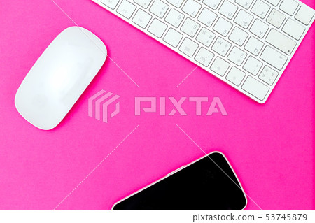 Desk top and technology on pink background Desk top and technology on pink background 53745879