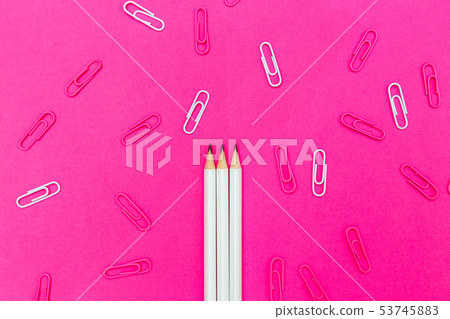 White pencil on a pink background White pencil on a pink background 53745883