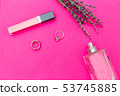 Female accessories on plastic pink background. 53745885