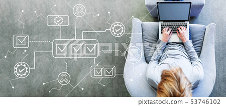 Quality control approval with man using a laptop 53746102