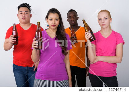 Studio shot of diverse group of multi ethnic friends holding bot 53746744