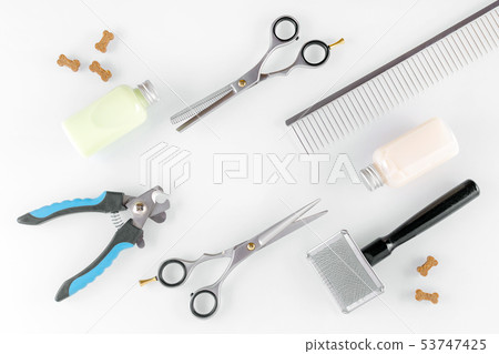 scissors with brush and comb for grooming, shampoo 53747425