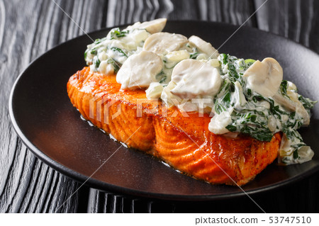 Baked Florentine salmon with creamy wine sauce, 53747510