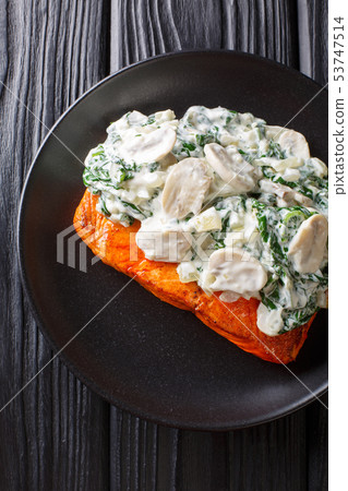 Florentine Salmon is simmered in a creamy wine 53747514