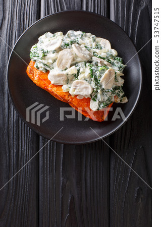 Baked Florentine salmon with creamy wine sauce, 53747515