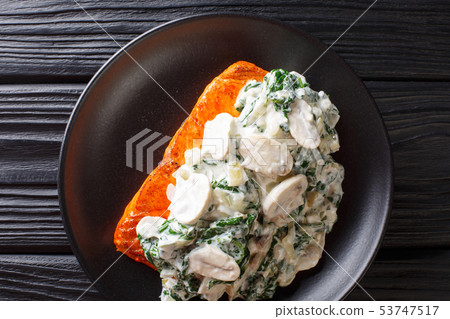 Florentine Salmon is simmered in a creamy wine 53747517