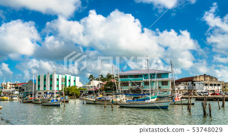 Houses and yachts at Haulover Creek in Belize City 53748029