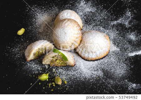 Maamoul - arabic homemade cookies. Close up. Maamoul - arabic homemade cookies. Close up. 53749492