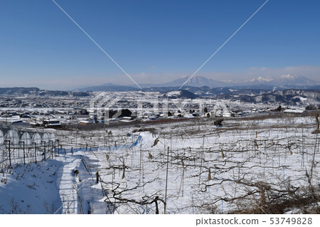 Snowy Nakano city distant view and Hokushin Goku 53749828