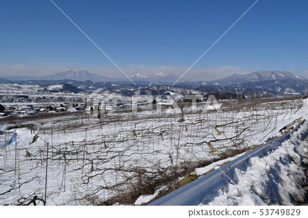 Snowy Nakano city distant view and Hokushin Goku 53749829