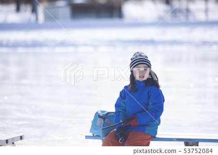 Girl enjoying skating 53752084