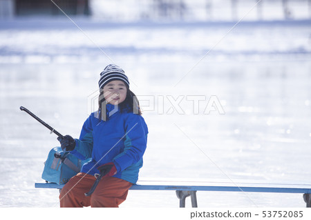 Girl enjoying skating 53752085