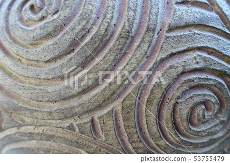 Texture Swirl pattern carved in pottery Texture Swirl pattern carved in pottery 53755479