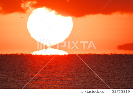 An island that floats in the air by the sun and mirage An island that floats in the air by the sun and mirage 53755819