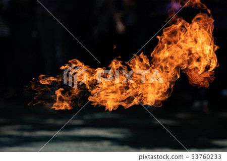 Closeup Fire flames from gas explosion on black Closeup Fire flames from gas explosion on black 53760233