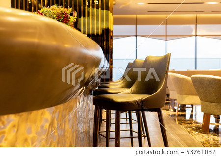 Interior design row of modern leather stools chair in luxury lounge. 53761032