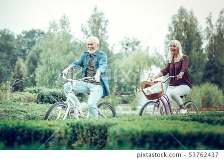 Joyful nice people enjoying their ride together Joyful nice people enjoying their ride together 53762437