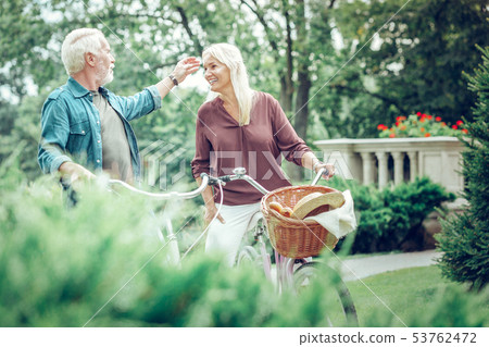 Joyful nice man touching his wifes face Joyful nice man touching his wifes face 53762472