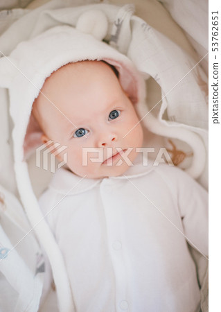 Baby in a straw basket 53762651