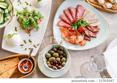 Gala dinner, serving table for birthday or wedding. Different meals for the guests on Banquet Gala dinner, serving table for birthday or wedding. Different meals for the guests on Banquet 53763047