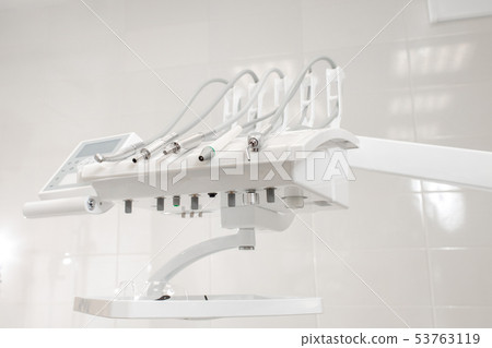 Closeup of a modern dentist tools. Drill tool in dental clinic. Medicine, health, stomatology 53763119