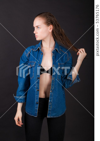 studio portrait of a very thin young woman 53765176