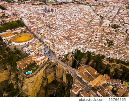 Ronda landscape and buildings with Puente Nuevo Bridge, Andalusia, Spain Ronda landscape and buildings with Puente Nuevo Bridge, Andalusia, Spain 53766365