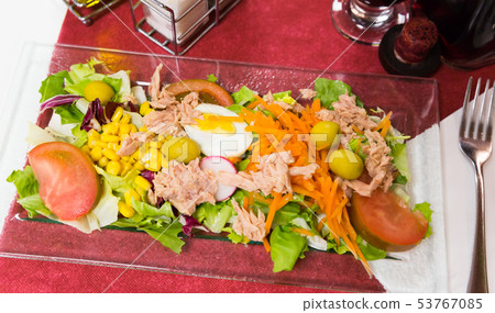 Salad with marinated tuna, vegetables, boiled carrot and lettuce Salad with marinated tuna, vegetables, boiled carrot and lettuce 53767085