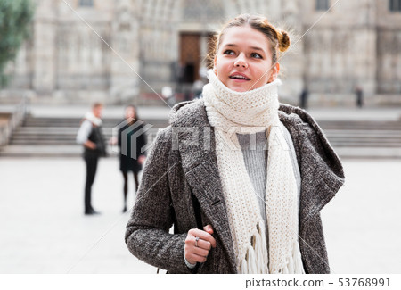 female in the historical city center 53768991