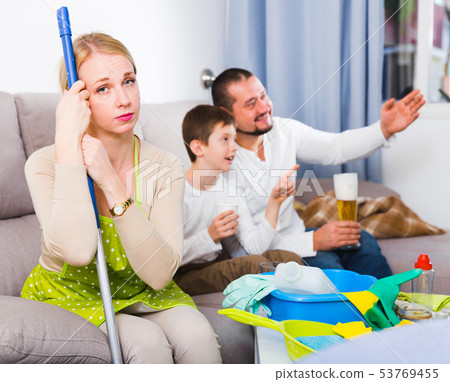 Tired woman with relaxing man with boy Tired woman with relaxing man with boy 53769455