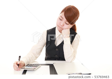 Suffering business woman Suffering business woman 53769463