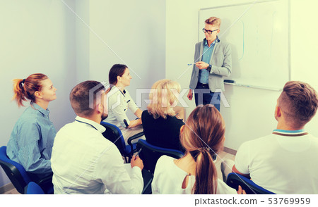 Group of glad students at extension courses Group of glad students at extension courses 53769959