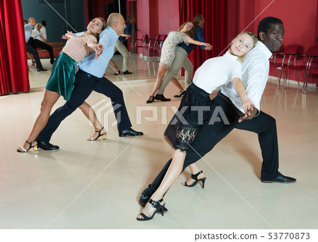 People dancing samba in pairs 53770873