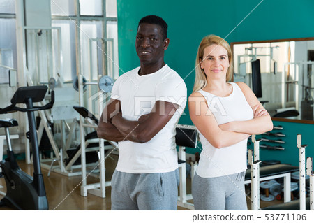 Couple posing at sport club Couple posing at sport club 53771106