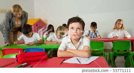 Portrait of bored schoolboy 53771111