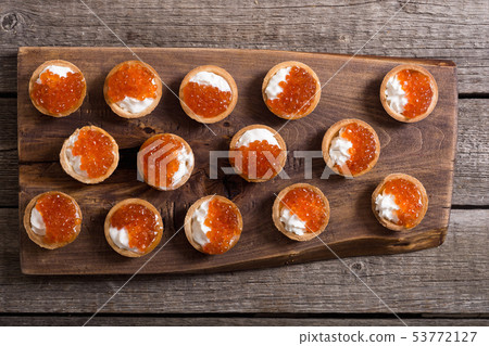 Tartalets with red caviar Tartalets with red caviar 53772127
