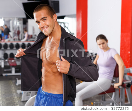 Portrait of sporty guy at gym 53772275